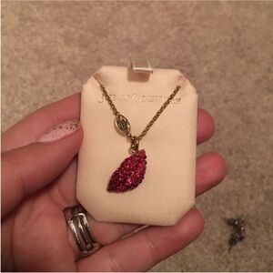 New in box Juicy Couture crystal lips necklace on gold colored adjustable chain